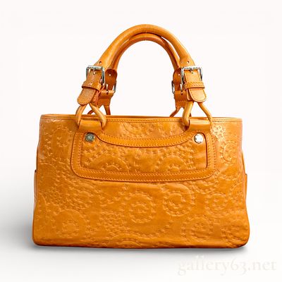 Celine Triomphe Embossed Leather Boogie Bag. Authentic Celine Boogie handbag crafted in warm tan 