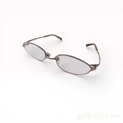 999.9 Four Nines Oval Eyeglasses with Slim Titanium Frame and Clear Lenses. this is one of the 