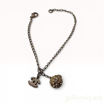Chanel 2007 Antiqued Silver-Tone Chanel Charm Bracelet with Crystal CC and Spherical Drops. This 