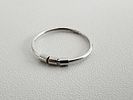 Charlotte Wooning Attributed Minimalist Silver-Toned Bead Ring. Minimalist band ring attributed Image - 1