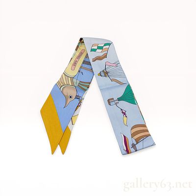 Herm&egrave;s Les Folies du Ciel Silk Twilly Scarf. Herm&egrave;s silk twilly scarf in the Les Folies du Ciel 