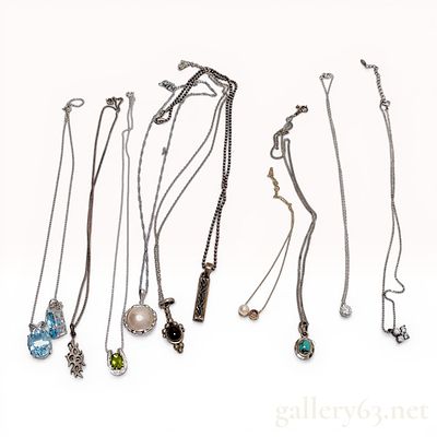 A Set of 10 Sterling Silver and Mixed Gemstone Pendant Necklaces. This collection consists of 