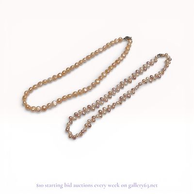 Two Cultured Freshwater Pearl Necklaces. A pair of cultured freshwater pearl necklaces featuring 