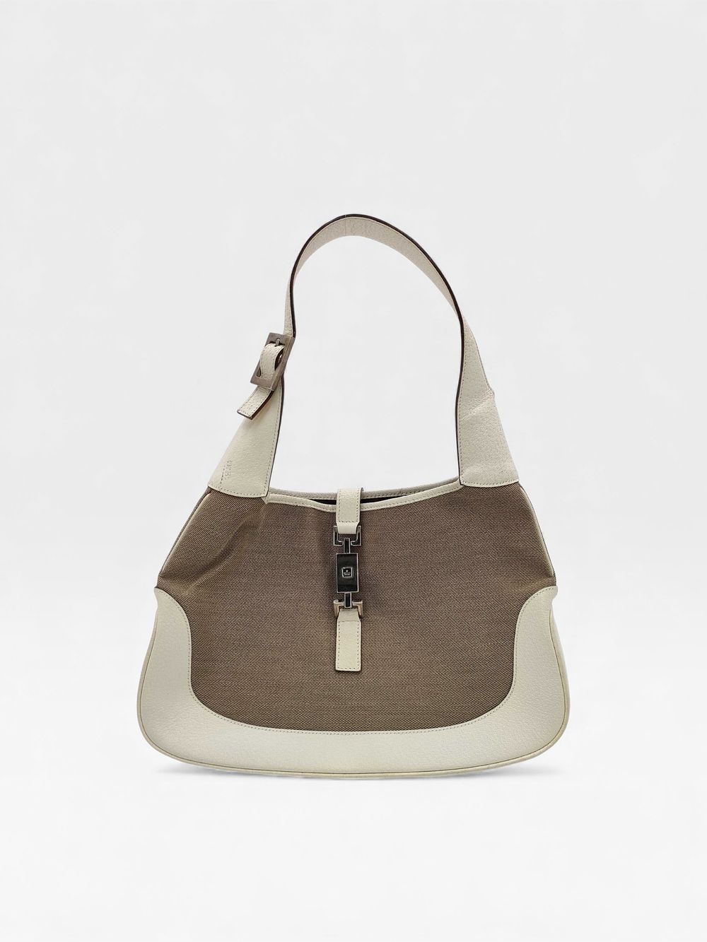 Gucci Jackie O Piston Lock Hobo Bag. Gucci Jackie hobo bag featuring a tan woven canvas body 