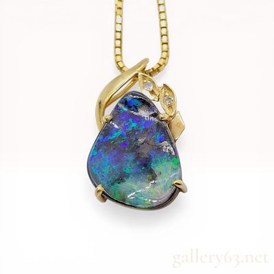 18K Yellow Gold Boulder Opal and Diamond Pendant Necklace. This contemporary pendant necklace 