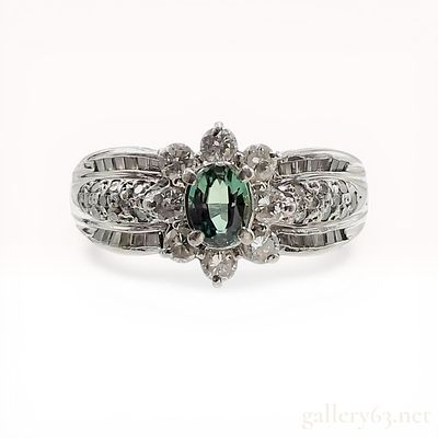 Platinum Alexandrite and Diamond Cocktail Ring. Platinum cocktail ring featuring an oval-cut 