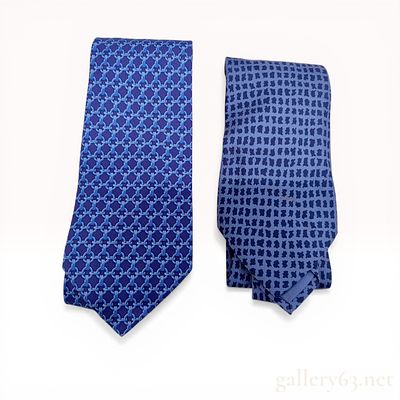 Two Men's Silk Neckties Including One by Hermes and One Attributed to Salvatore Ferragamo. Two 