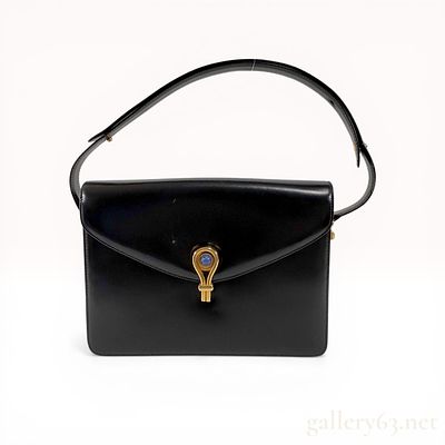 1960s Gucci Vintage Black Calfskin Handbag with Lapis Lazuli G-Clasp. Gucci vintage 