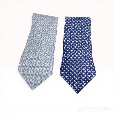 Two Hermes Silk Print Neckties. Two Hermes silk neckties featuring printed patterns, made in 