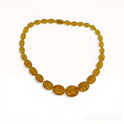 Graduated Honey Amber Bead Necklace with Sun Spangle Inclusions. Graduated honey amber bead 