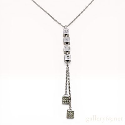 Christian Dior Silver-Tone Logo Dice Cube Lariat Necklace. Christian Dior silver-tone costume 