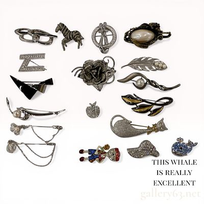 An Assortment of Seventeen Contemporary Costume Jewelry Brooches and Pins. An assortment of 