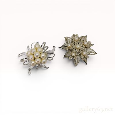 Two Mid-Century Japanese Silver and Pearl Floral Brooches. Two mid-century Japanese floral 