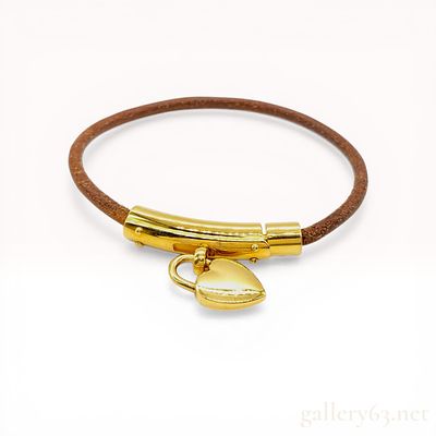 Hermes Brown Leather Cord Bracelet with 2004 Viva l’Idea Heart Cadena. Hermes leather cord 