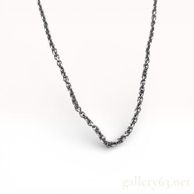 Sterling Silver Coach Cable Chain Necklace with Logo Tag. This sterling silver necklace by Coach 