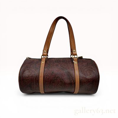 Etro Paisley Coated Canvas Barrel Bag. Etro barrel bag featuring the signature paisley motif on 