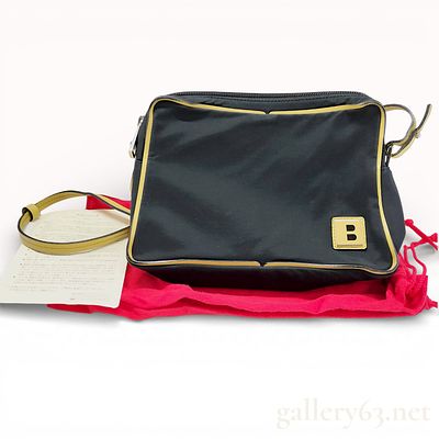 Bally Nylon and Leather Crossbody Bag Black and Yellow. This Bally shoulder bag is crafted from 