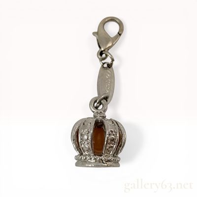 Lazy Susan Crown Charm with Orange Bead. Lazy Susan crown-shaped charm. The silver-toned metal 
