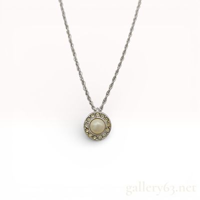 Christian Dior Faux Pearl and Rhinestone Silver-Tone Necklace. A Christian Dior silver-tone 