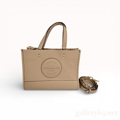 Coach Dempsey Tote 22 Pebbled Leather Taupe. This Coach Dempsey Tote 22 is crafted from refined 