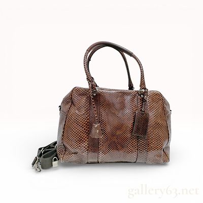 Dolce & Gabbana Brown Python Snakeskin Top Handle Travel Bag. This Dolce & Gabbana travel bag is 