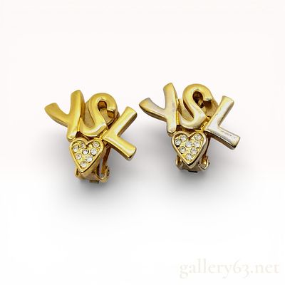 Gold-Toned YSL Logo Clip-On Earrings with Rhinestone Heart. A matched pair of vintage Yves Saint 