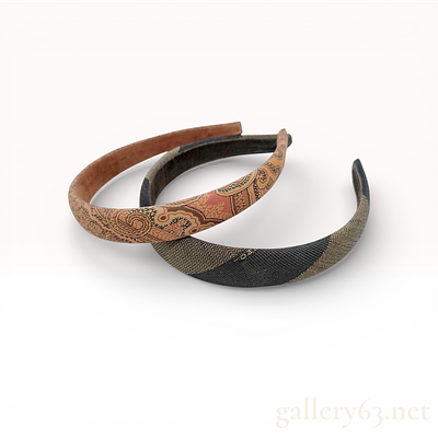 A Pair of Fendi and Paisley Fabric-Covered Headbands. This lot features two fabric-covered hair 