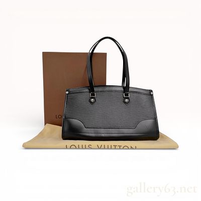 Louis Vuitton Madeleine PM Epi Leather Noir. A Louis Vuitton Madeleine PM shoulder bag crafted 
