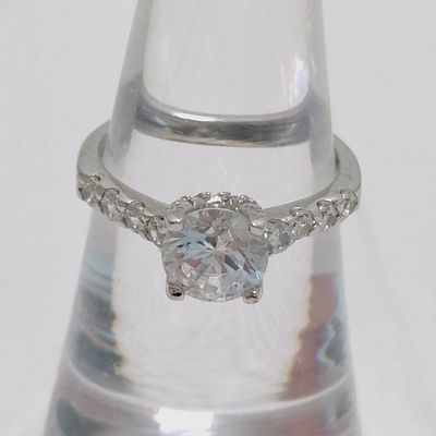 Sterling Silver Round Brilliant-Cut Solitaire Ring with Accented Shoulders. Engagement-style 