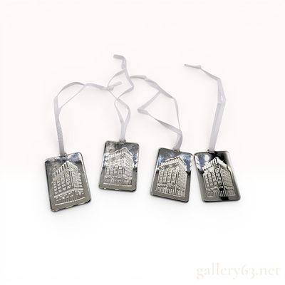 Set of Four Tiffany & Co. The Landmark 727 Fifth Avenue Commemorative Metal Tags. This 