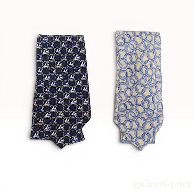Two Chanel Silk Neckties. Two Chanel silk neckties featuring printed patterns and signature 