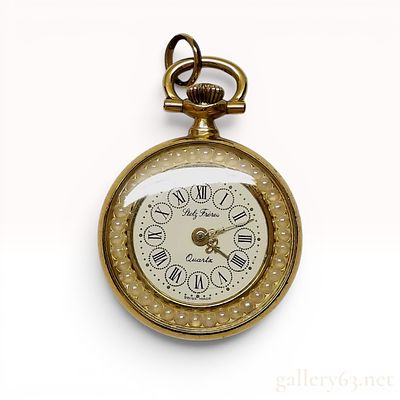Stolz Freres Swiss Made Gold Tone and Enamel Quartz Pendant Watch. Stolz Freres Swiss made 