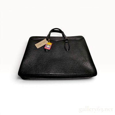 Oscar de la Renta Black Textured Leather Business Bag. Oscar de la Renta business bag crafted 