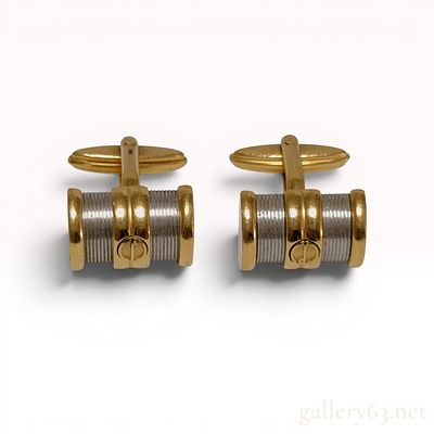 A Pair of Dunhill Two-Tone Semi-Cylindrical Reeded Cufflinks. A pair of two-tone metal cufflinks 