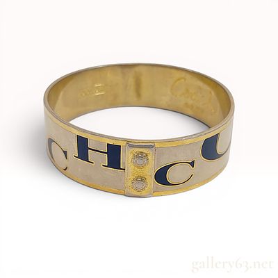 Coach Enamel and Gold-Tone Logo Bangle Bracelet. Coach gold-tone and enamel bangle bracelet 