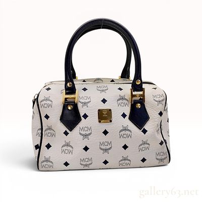 MCM White Visetos Monogram Coated Canvas Boston Bag. MCM Boston bag crafted from white Visetos 