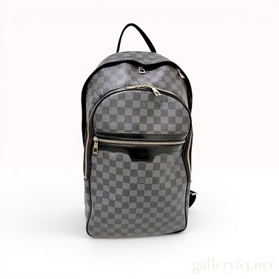Louis Vuitton Michael Backpack in Damier Graphite Canvas. This Louis Vuitton Michael backpack is 