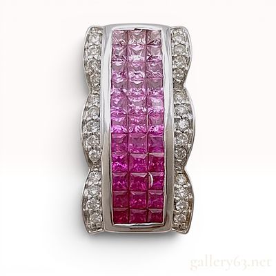 18K White Gold Ruby, Pink Sapphire, and Diamond Pendant. 18-karat white gold pendant featuring a 