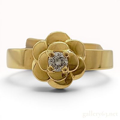 Chanel 18K Yellow Gold and Diamond Camelia Ring. This Chanel ring from the Camelia collection is 
