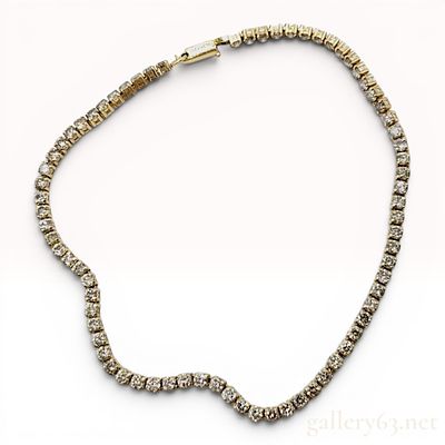 18K Yellow Gold and 3.00 Carat Diamond Tennis Bracelet. This tennis style bracelet is crafted in 