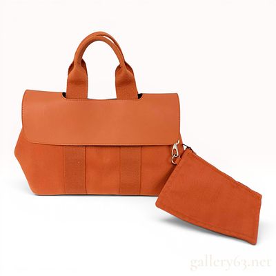 Hermes Valparaiso PM Orange Toile Chevron and Leather Handbag. This Hermes Valparaiso PM handbag 