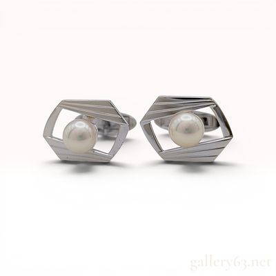 A Pair of Mikimoto Cultured Pearl and Silver Cufflinks with Box & COA. A pair of Mikimoto 