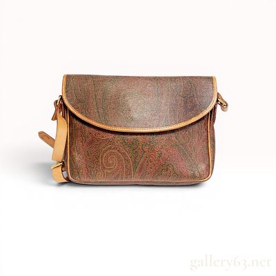 Vintage Etro Paisley Coated Canvas Crossbody Bag. This vintage crossbody bag by Etro is crafted 