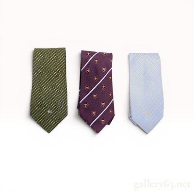 A Trio of Burberry Designer Silk Neckties. A collection of three men's designer neckties 