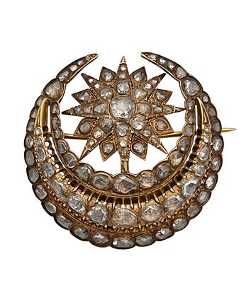 A large and impressive ancient Turkish brooch made of gold, and set with 