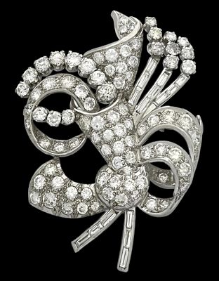 A large and impressive Art Deco platinum brooch, set with about 12 carats of 