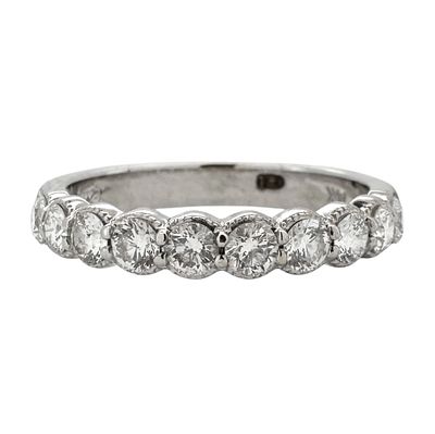 Classic 14K gold ring set with natural white diamonds totaling 0.70ct, the ring is signed.