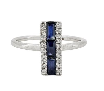 A 14K gold ring with a special design, set with diamonds and sapphire gemstones with a total