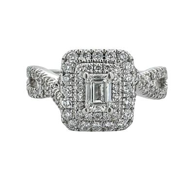 A 1.00ct luxurious and impressive 14K gold ring set with 1.00ct of white diamonds, the central