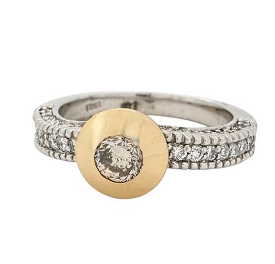 A 14K gold ring in combination of yellow and white gold set with 1.00ct of white diamonds, The